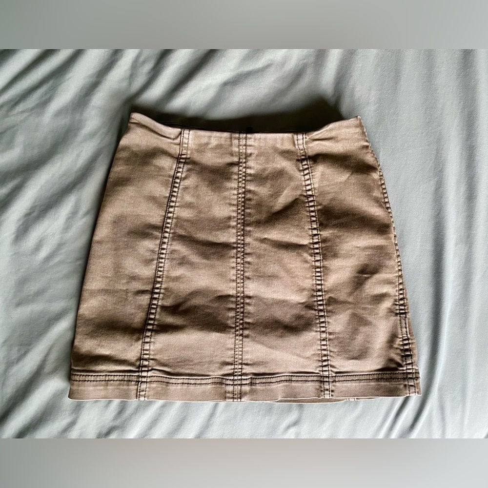 Mini green skirt from free people in a women’s size 0
